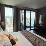 Deluxe Room with Ocean and City View
